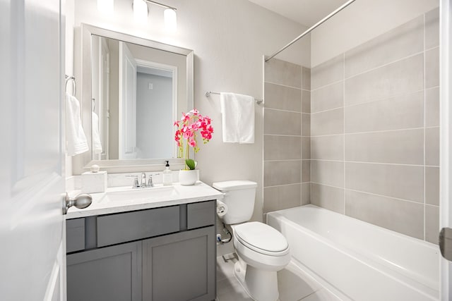 full bathroom with washtub / shower combination, toilet, and vanity