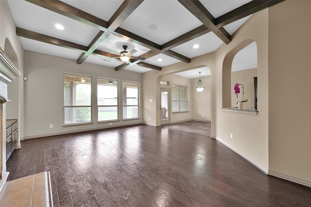 4510 Sanctuary Trails Dr, Spring, TX 77388 - unfurnished living room featuring coffered ceiling, baseboards, wood finished floors, a ceiling fan, and arched walkways