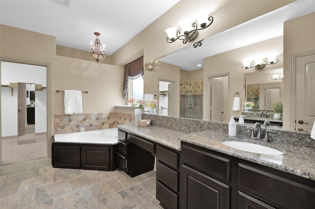 4510 Sanctuary Trails Dr, Spring, TX 77388 - full bathroom with a stall shower, a chandelier, a garden tub, and vanity