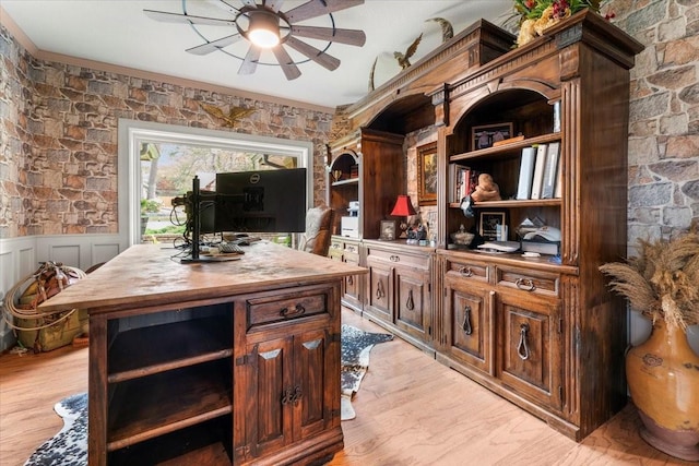 interior space with open shelves, wood counters, ceiling fan, and light wood finished floors