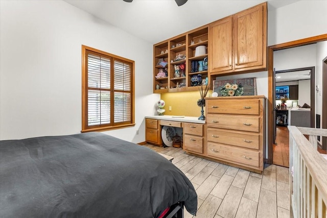 bedroom featuring a ceiling fan and light wood-style flooring