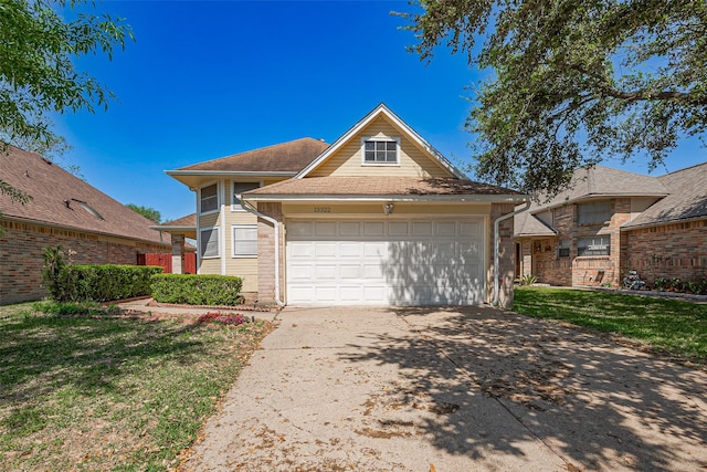 13322 Chaston Dr, Houston, TX 77041 - view of front of home featuring driveway, a garage, and a front yard