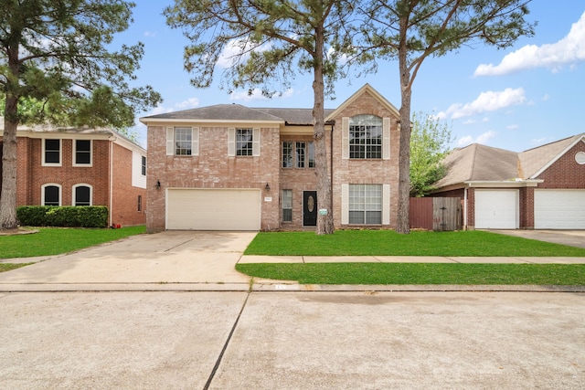 14507 Heron Marsh Dr, Cypress, TX 77429 - view of front facade featuring driveway, brick siding, and a garage
