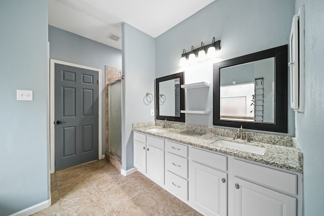 14507 Heron Marsh Dr, Cypress, TX 77429 - full bath featuring double vanity, a stall shower, and baseboards