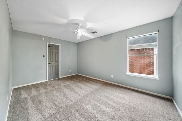 14507 Heron Marsh Dr, Cypress, TX 77429 - empty room with carpet, ceiling fan, and baseboards