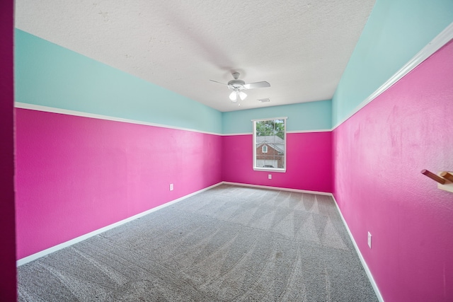 14507 Heron Marsh Dr, Cypress, TX 77429 - carpeted spare room with ceiling fan, a textured ceiling, and baseboards