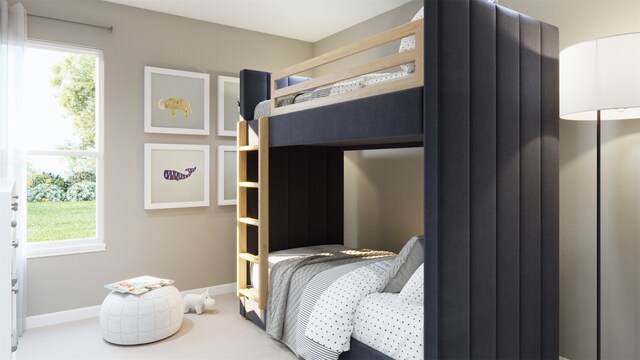 bedroom featuring baseboards