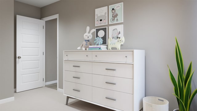 interior space featuring baseboards