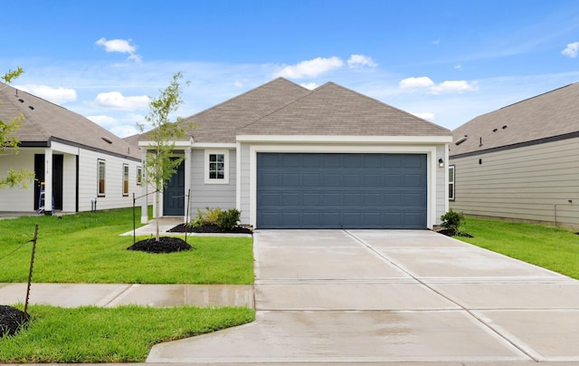 8116 Vanilla Orchid Dr, Houston, TX 77016 - view of front facade with concrete driveway, a front yard, a garage, and a shingled roof