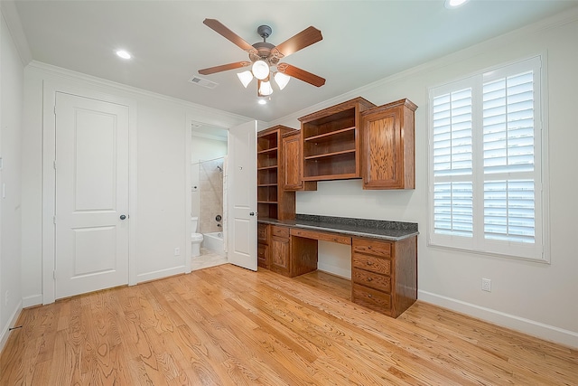 1804 Haddon St, Houston, TX 77019 - unfurnished office with built in desk, a ceiling fan, baseboards, light wood-type flooring, and crown molding