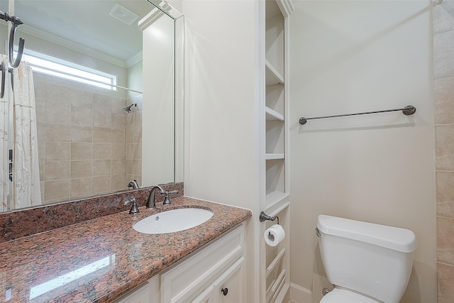 1804 Haddon St, Houston, TX 77019 - full bathroom featuring toilet, vanity, crown molding, and a tile shower