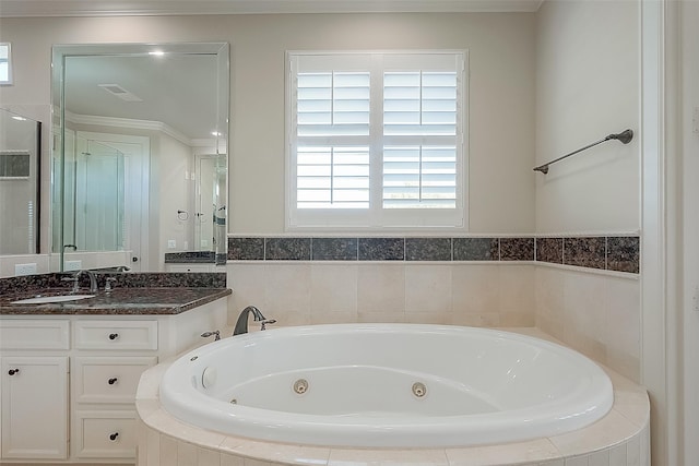 1804 Haddon St, Houston, TX 77019 - bathroom featuring a whirlpool tub, vanity, a shower with shower door, and ornamental molding