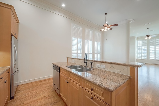 1804 Haddon St, Houston, TX 77019 - kitchen with a ceiling fan, a sink, stainless steel appliances, crown molding, and light wood-style flooring