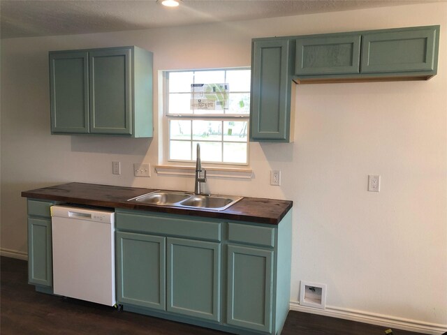 606 N Danville St, Willis, TX 77378 - kitchen with white dishwasher, green cabinets, and recessed lighting