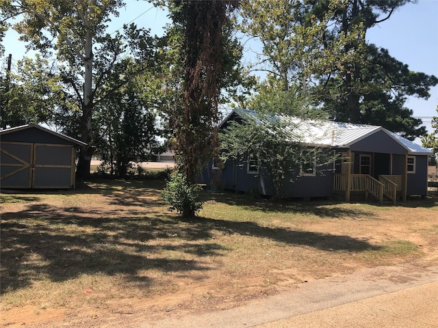 606 N Danville St, Willis, TX 77378 - view of grassy yard