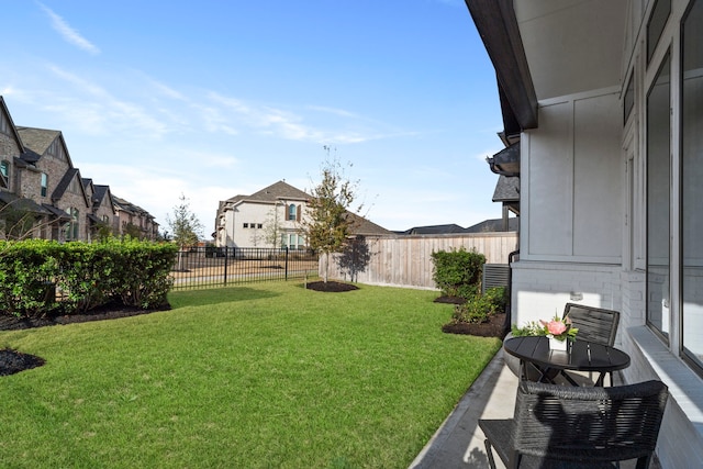 view of yard featuring a fenced backyard