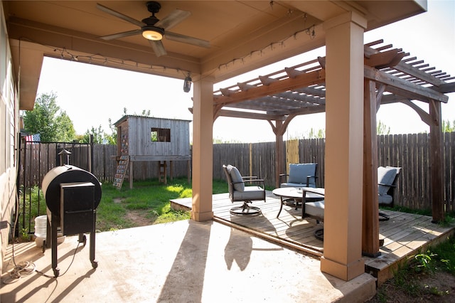 view of patio / terrace with ceiling fan, a pergola, and a fenced backyard