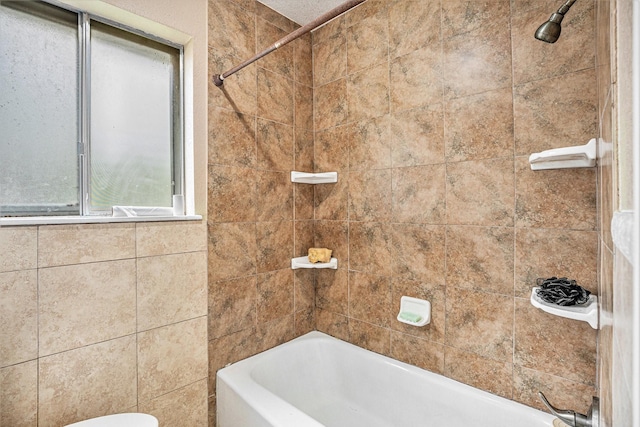 bathroom featuring  shower combination