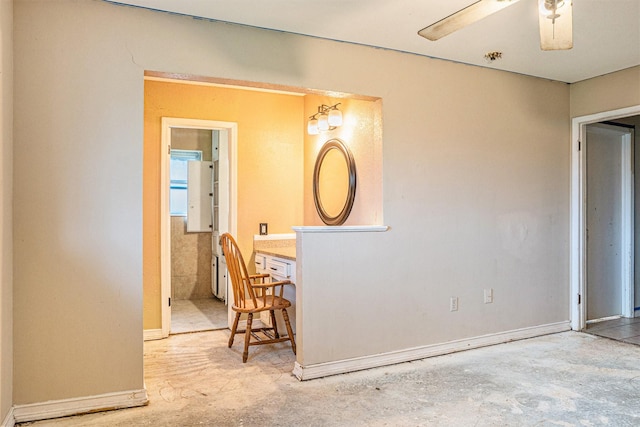 dining area with unfinished concrete floors and a ceiling fan