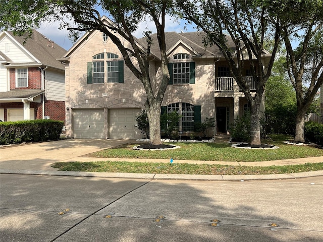 view of front facade featuring concrete driveway, a garage, and brick siding