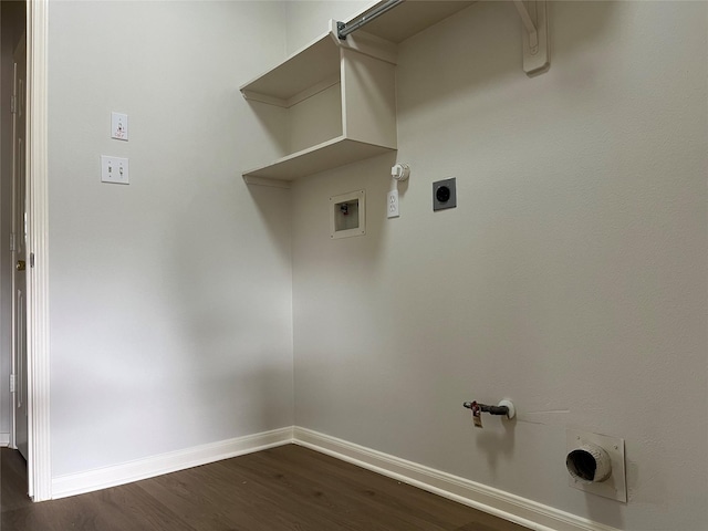 washroom featuring laundry area, dark wood-type flooring, washer hookup, gas dryer hookup, and baseboards