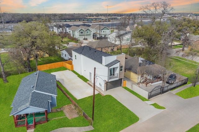 aerial view at dusk with a residential view