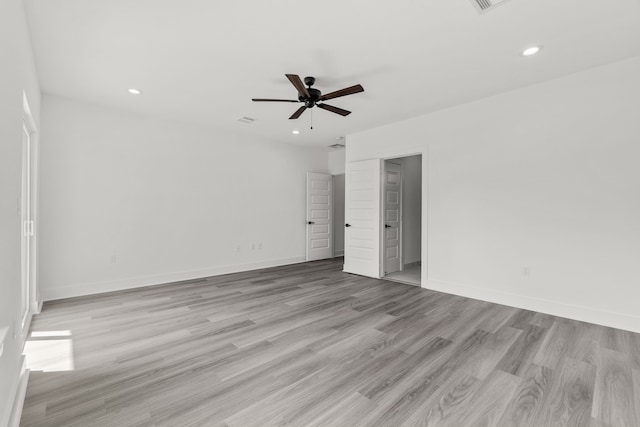 unfurnished bedroom with baseboards, a ceiling fan, recessed lighting, and light wood-type flooring