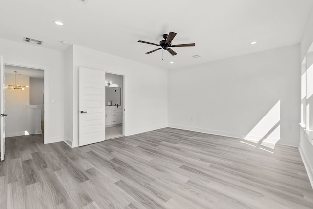 unfurnished bedroom featuring baseboards, visible vents, light wood-style flooring, and recessed lighting