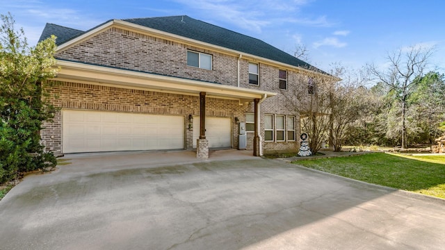 8408 Grand Lake Estates Dr, Montgomery, TX 77316 - view of front of house with driveway, brick siding, and a front yard