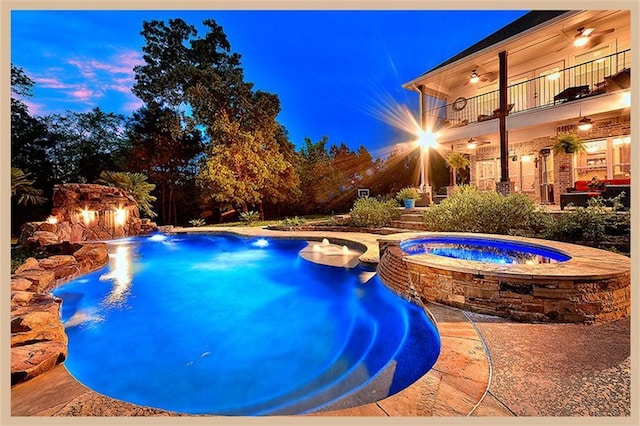 8408 Grand Lake Estates Dr, Montgomery, TX 77316 - view of pool featuring a pool with connected hot tub and ceiling fan