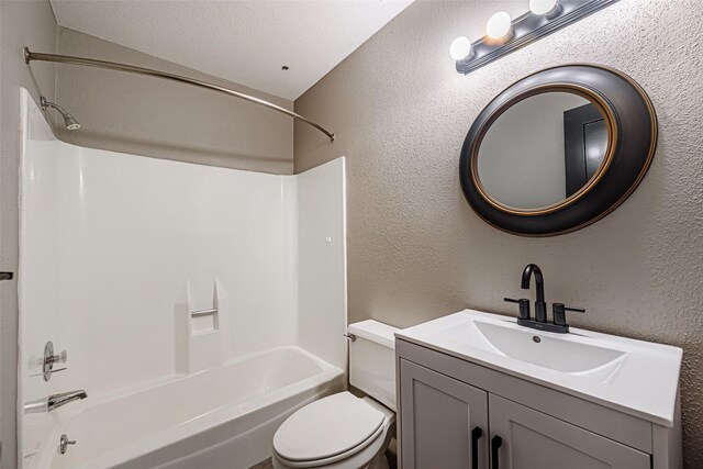 3226 Poe Dr, Montgomery, TX 77356 - full bathroom featuring toilet, shower / bathing tub combination, vanity, and a textured wall