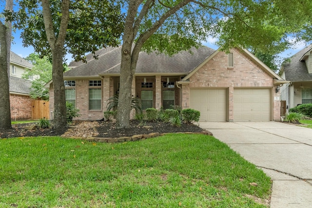 31 Trilling Bird Pl, The Woodlands, TX 77384 - view of front of home featuring brick siding, a garage, driveway, and a shingled roof