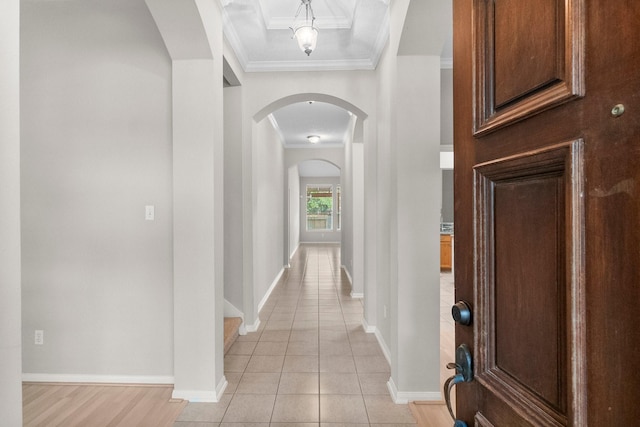 31 Trilling Bird Pl, The Woodlands, TX 77384 - corridor with ornamental molding, arched walkways, and light tile patterned floors