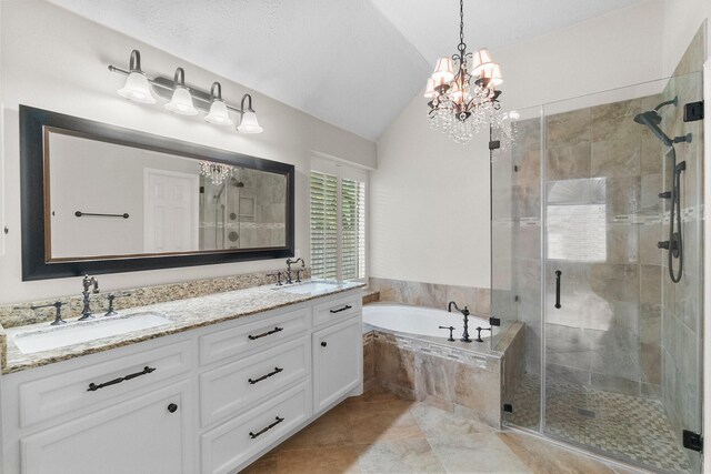 31 Trilling Bird Pl, The Woodlands, TX 77384 - bathroom featuring lofted ceiling, a chandelier, a garden tub, double vanity, and a stall shower