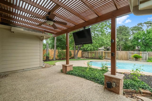 31 Trilling Bird Pl, The Woodlands, TX 77384 - fenced backyard with a pergola, a patio area, and ceiling fan