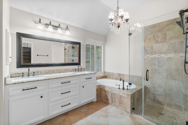 31 Trilling Bird Pl, The Woodlands, TX 77384 - full bath featuring a garden tub, double vanity, a shower stall, a chandelier, and lofted ceiling