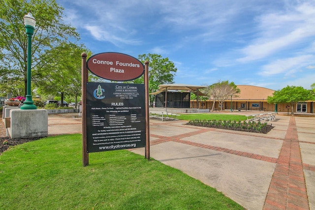view of community with a lawn