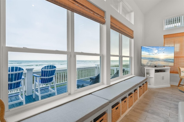 17431 Bristow Dr, Galveston, TX 77554 - mudroom featuring a water view, a beach view, vaulted ceiling, and light wood-type flooring