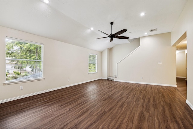 7107 Grant Dr, Magnolia, TX 77354 - unfurnished living room featuring healthy amount of natural light, ceiling fan, dark wood-type flooring, baseboards, and recessed lighting