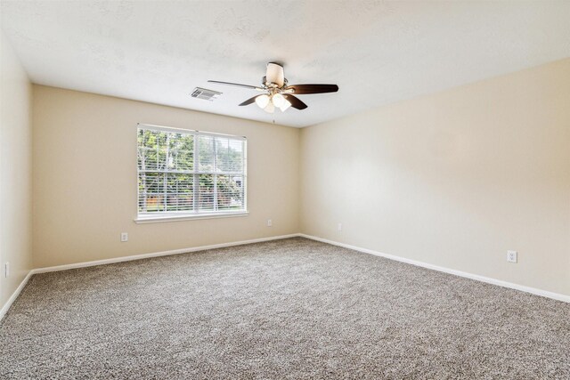 7107 Grant Dr, Magnolia, TX 77354 - spare room with ceiling fan, carpet flooring, and baseboards