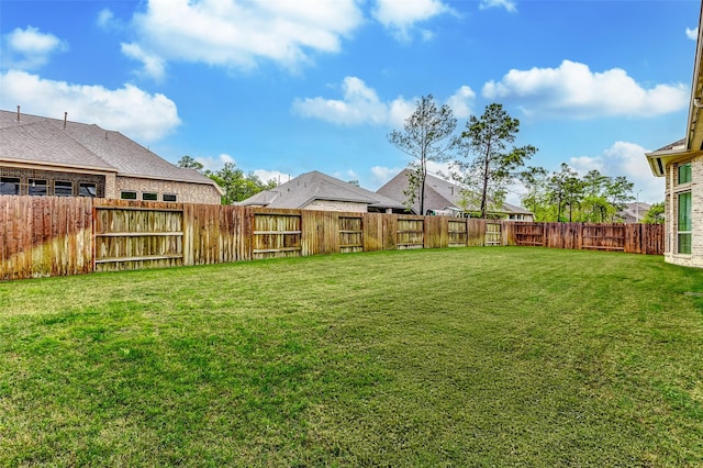 12306 Wildrye Prairie Trce, Humble, TX 77346 - view of yard featuring a fenced backyard
