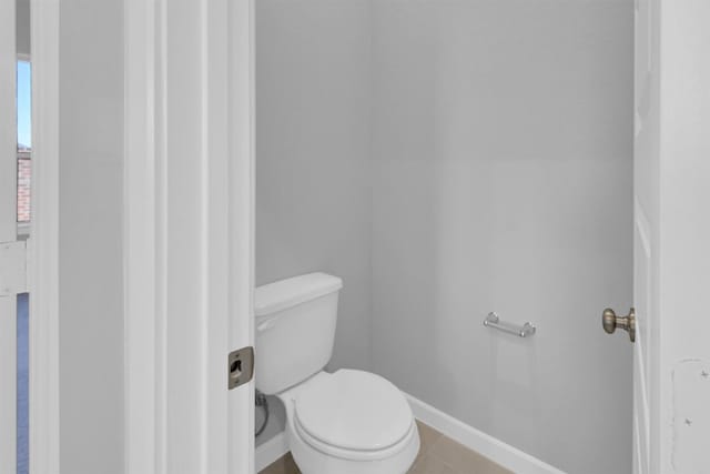 5028 Marcasca Dr, Katy, TX 77493 - bathroom with tile patterned floors, baseboards, and toilet