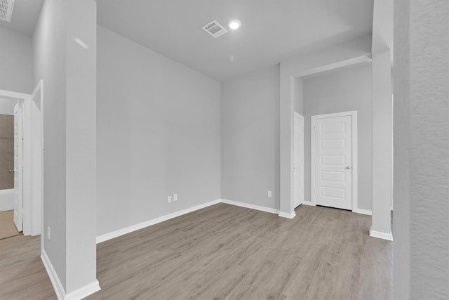 5028 Marcasca Dr, Katy, TX 77493 - empty room with visible vents, baseboards, and wood finished floors
