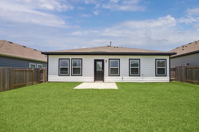 12260 Lady Eli Dr, Willis, TX 77318 - back of house featuring a fenced backyard and a patio area