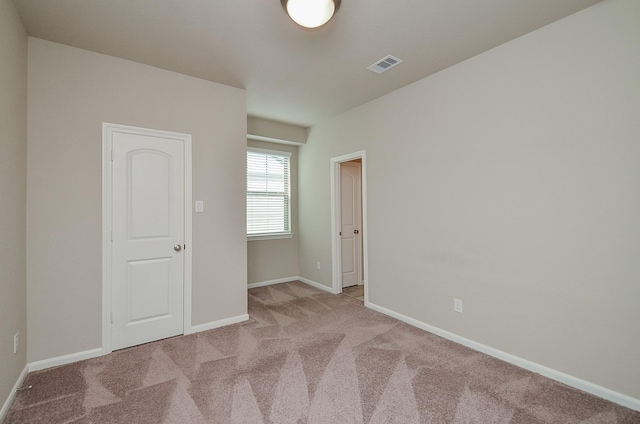 5203 Prairie Terrace Ln, Fulshear, TX 77441 - unfurnished room featuring baseboards, visible vents, and light carpet