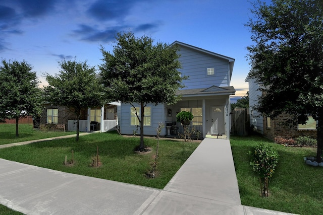 11314 Carla St, Houston, TX 77076 - view of front facade featuring a front lawn and a porch