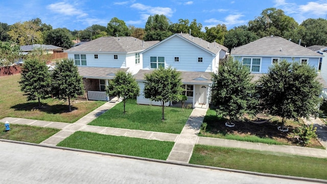 11314 Carla St, Houston, TX 77076 - view of front of property featuring a front lawn and roof with shingles