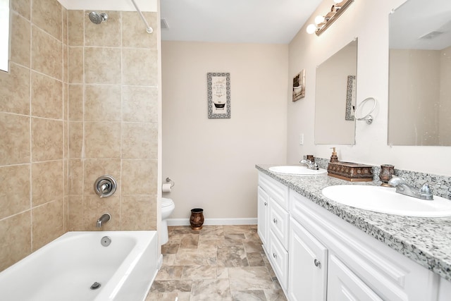 11314 Carla St, Houston, TX 77076 - full bath featuring baseboards, double vanity, a sink, and toilet