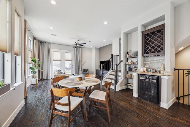2718 Leeland St Unit A, Houston, TX 77003 - dining room with beverage cooler, a dry bar, stairway, dark wood finished floors, and recessed lighting