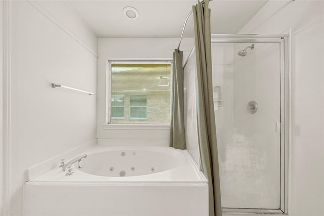 2904 Bristol Bend Ln, Dickinson, TX 77539 - bathroom featuring a shower stall and a tub with jets